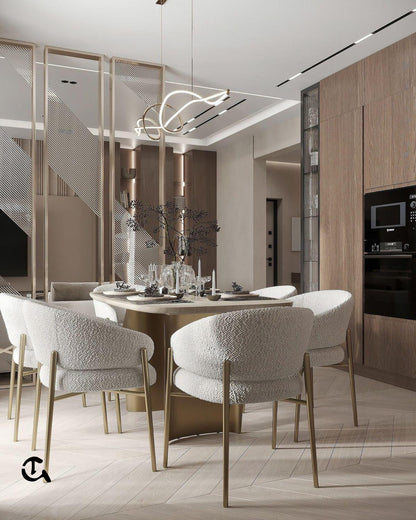 Écrin d'Ivoire
Une salle à manger chaleureuse en tissu bouclé et finitions dorées pour un style chic et épuré.
Aura Dorée
Un design moderne et lumineux qui associe matières nobles et minimalisme élégant.