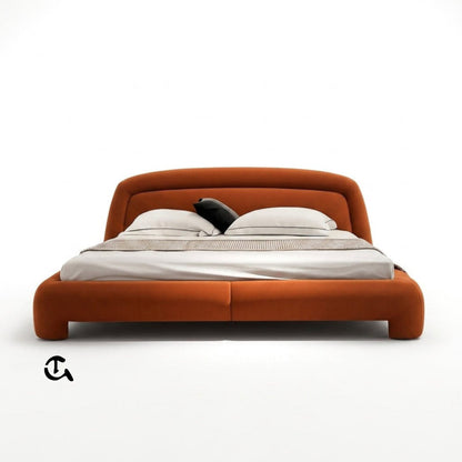 Le Cocon d'Ambre
Une chambre à coucher chaleureuse et raffinée, où la douceur du velours couleur terre cuite rencontre la naturalité du rotin et du bois clair. La lumière tamisée qui filtre à travers les rideaux en lin crée une atmosphère apaisante, idéa