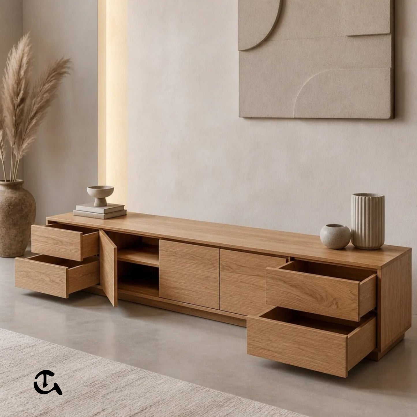 Un meuble TV en bois clair au design minimaliste et chaleureux.
Complété par une déco neutre pour une ambiance douce et élégante.