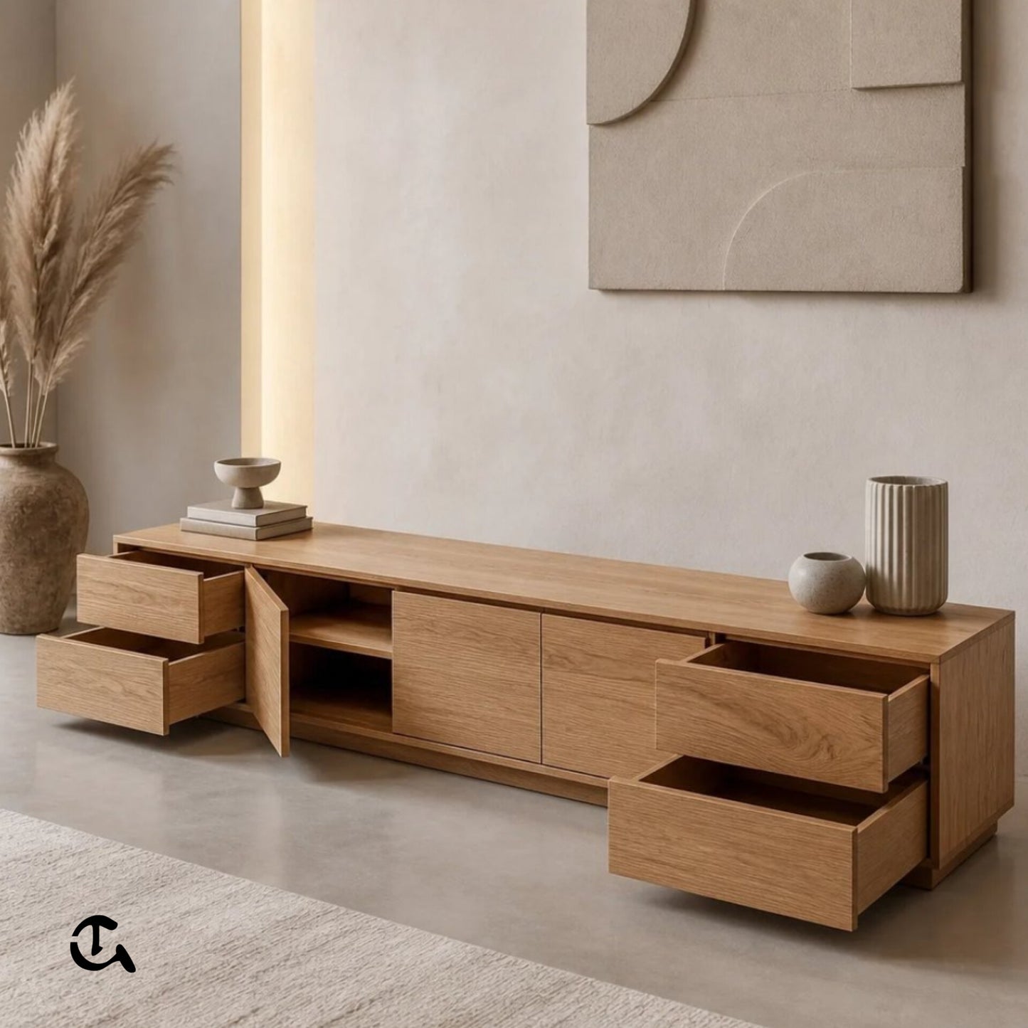 Un meuble TV en bois clair au design minimaliste et chaleureux.
Complété par une déco neutre pour une ambiance douce et élégante.