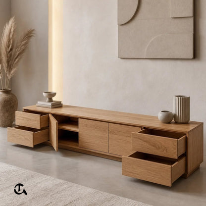 Un meuble TV en bois clair au design minimaliste et chaleureux.
Complété par une déco neutre pour une ambiance douce et élégante.