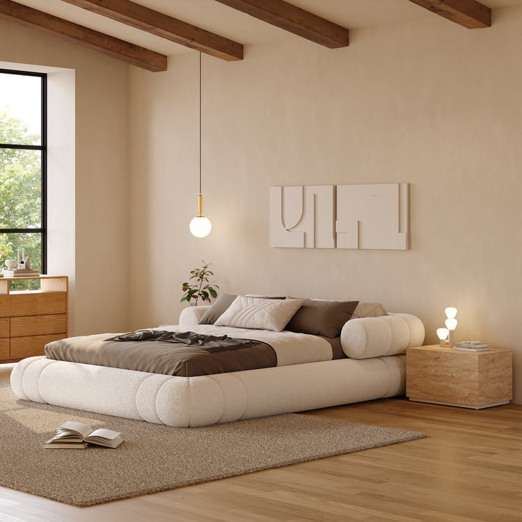 CHAMBRE SÉRÉNITÉ
Lit en tissu bouclé blanc et chevets suspendus en bois avec LED.