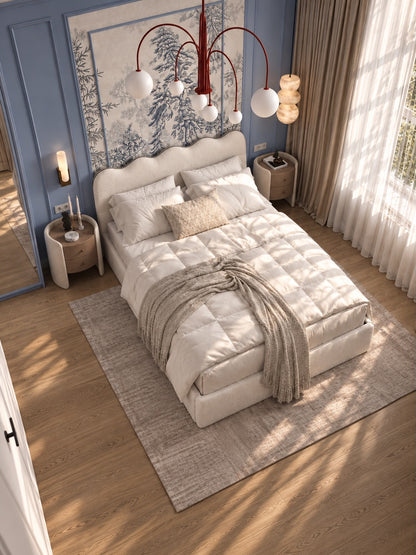 Lit Onde - Un lit au design moderne et élégant qui allie un confort exceptionnel à une esthétique raffinée. Doté d'une tête de lit enveloppante et d'un revêtement de haute qualité, il s'intègre parfaitement dans toutes les chambres pour un sommeil tout en