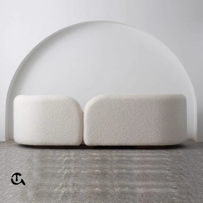Canapé Curve Bouclé – Off WhiteDescription : Sublimez votre salon avec ce canapé moderne aux formes courbes et au tissu bouclé ultra-doux. (Copie)